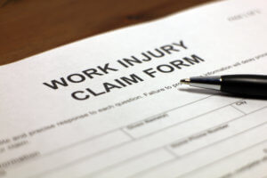 Worker filing a workers' compensation application.