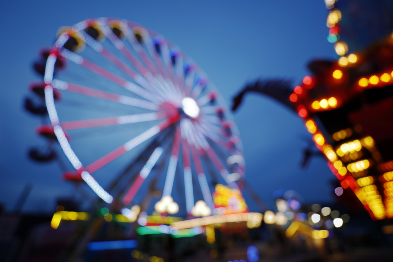Amusement park with ferris wheel
